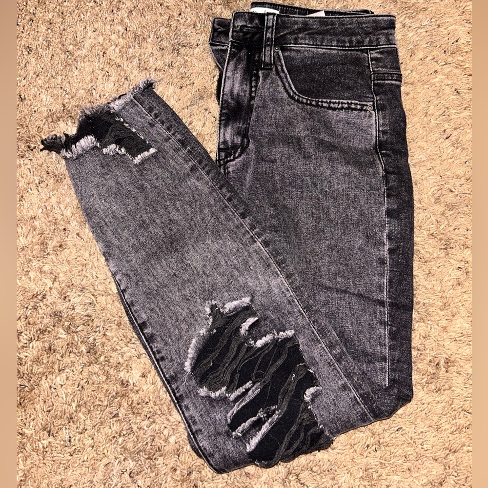 black ripped jeans
